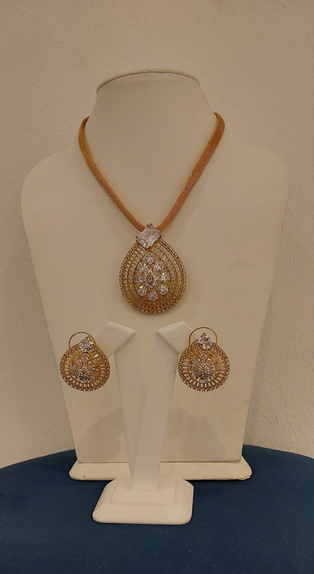 Ishani White Crystal and Gold Flower Pendant