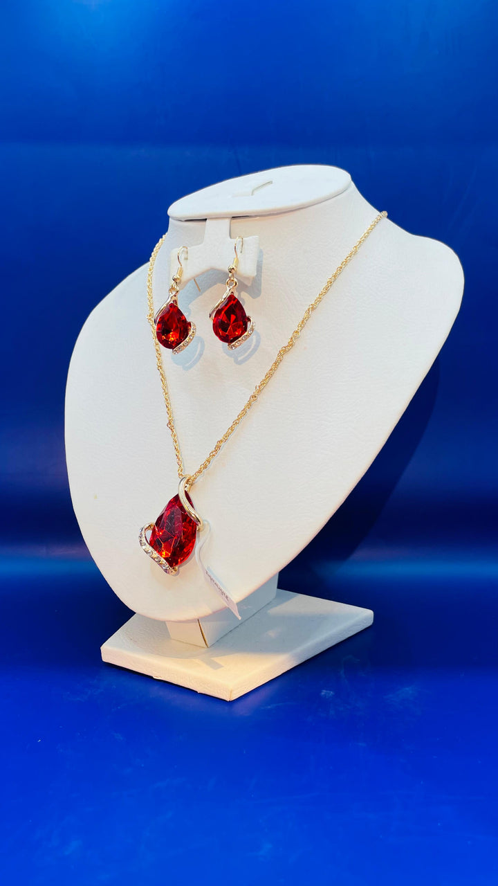 Our "Zuhi'' Gold with Ruby Necklace and Earring Set