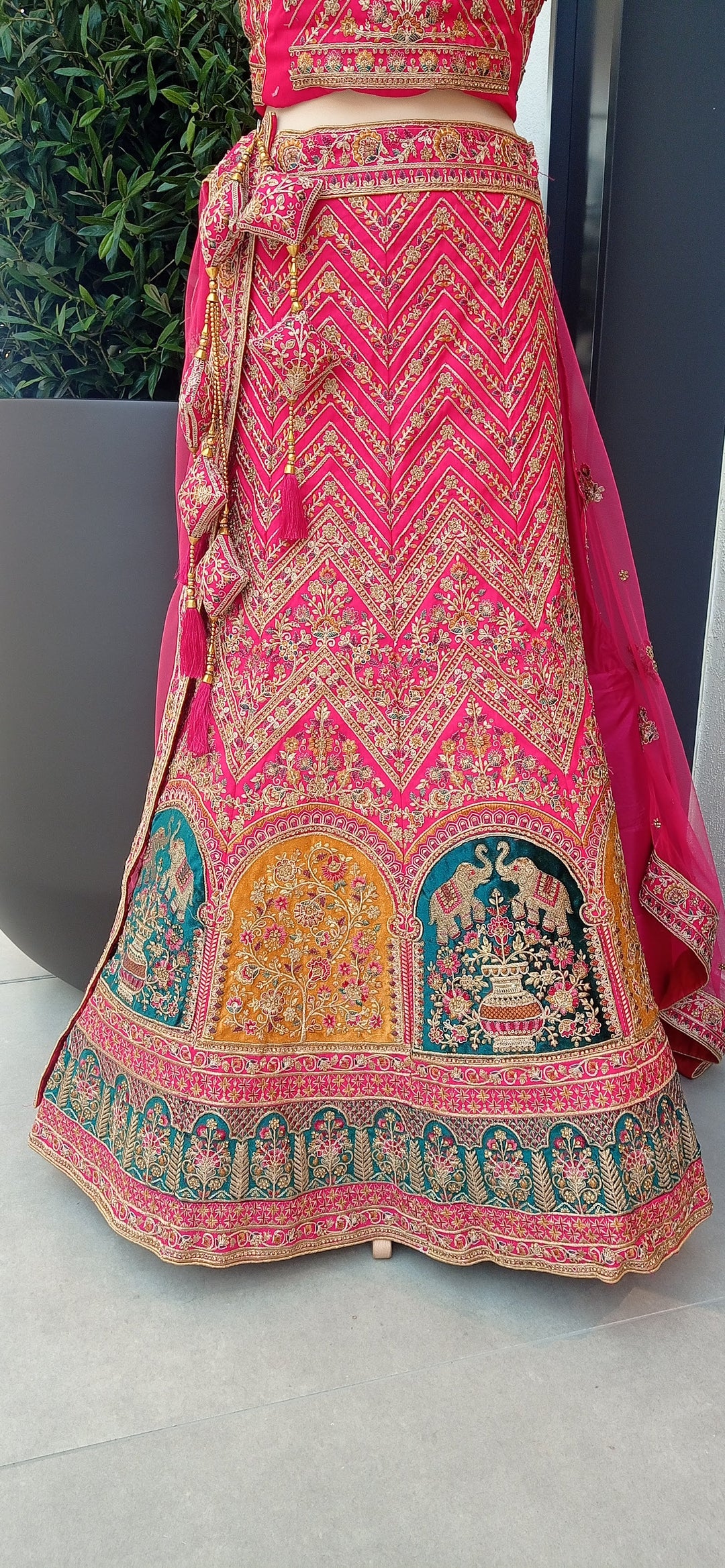 Shagun Bridal Rani Pink and Gold Mughal Lehenga in dubai (Unstitched)