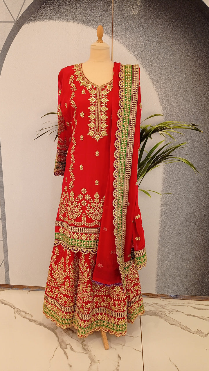 Navya Red and Green Lehenga Best indian Outfits in Dubai