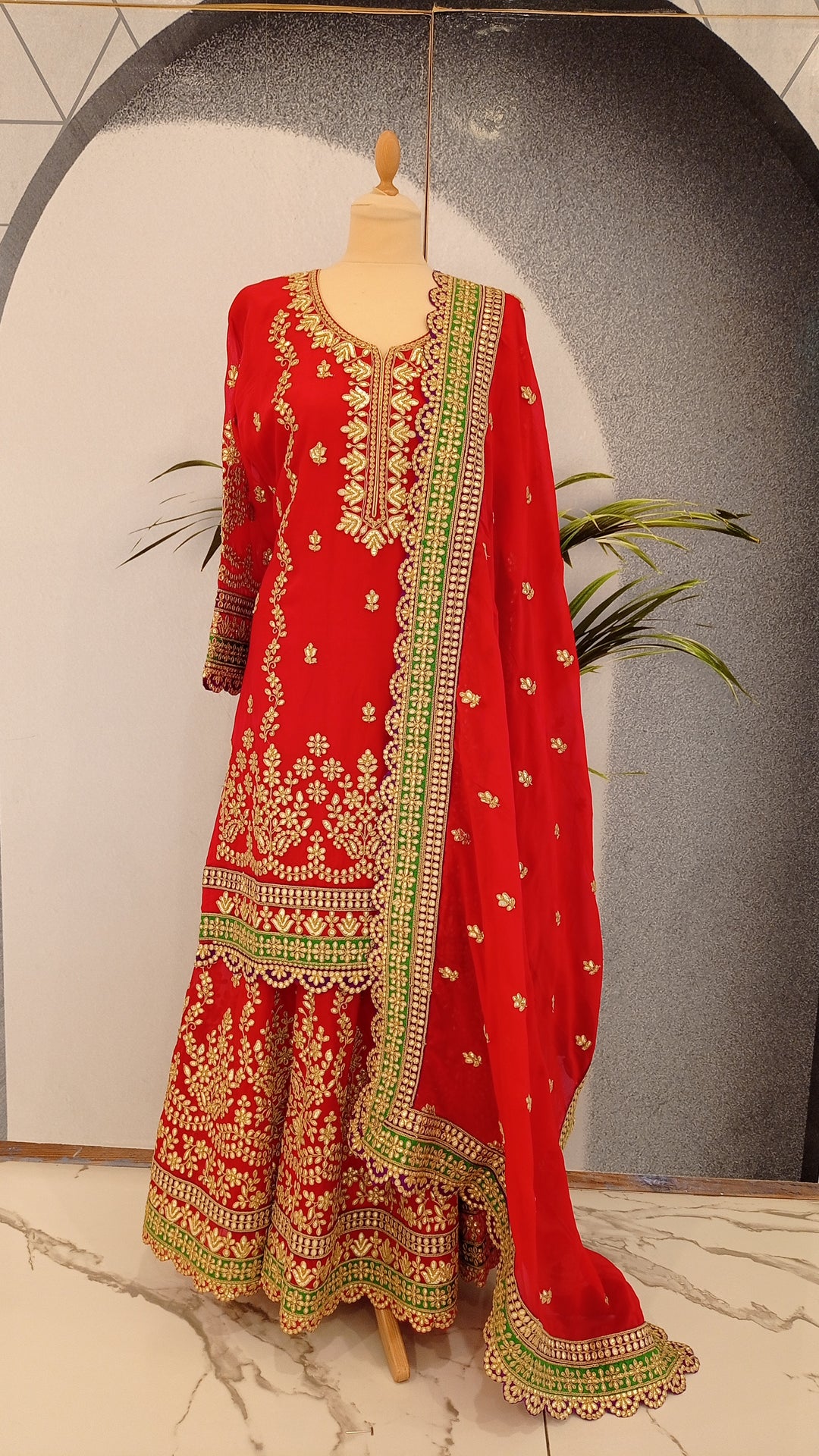 Navya Red and Green Lehenga Best indian Outfits in Dubai