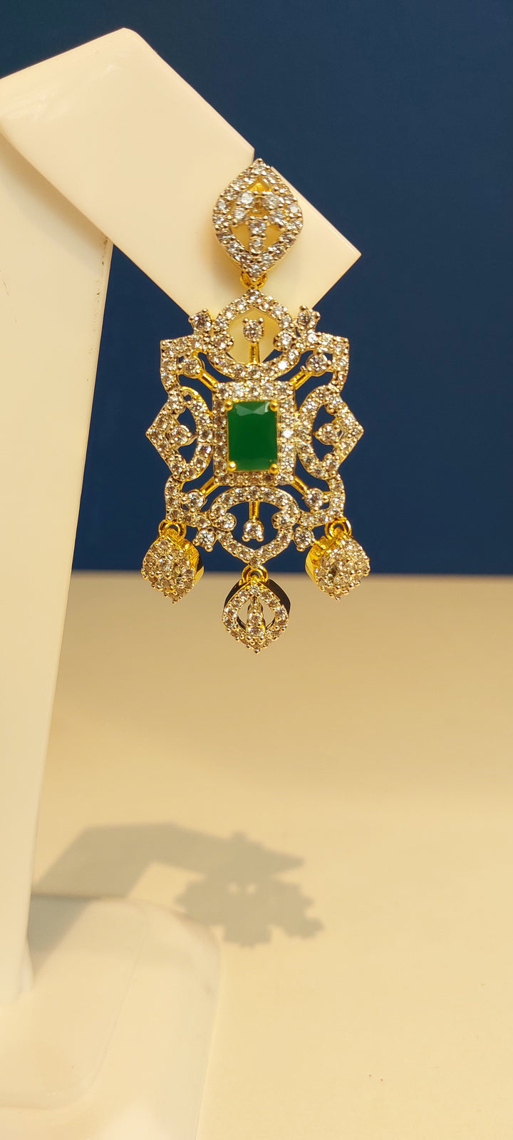 Riddhima Zircon Diamond, Gold and Emerald Destination Necklace and Earrings Set