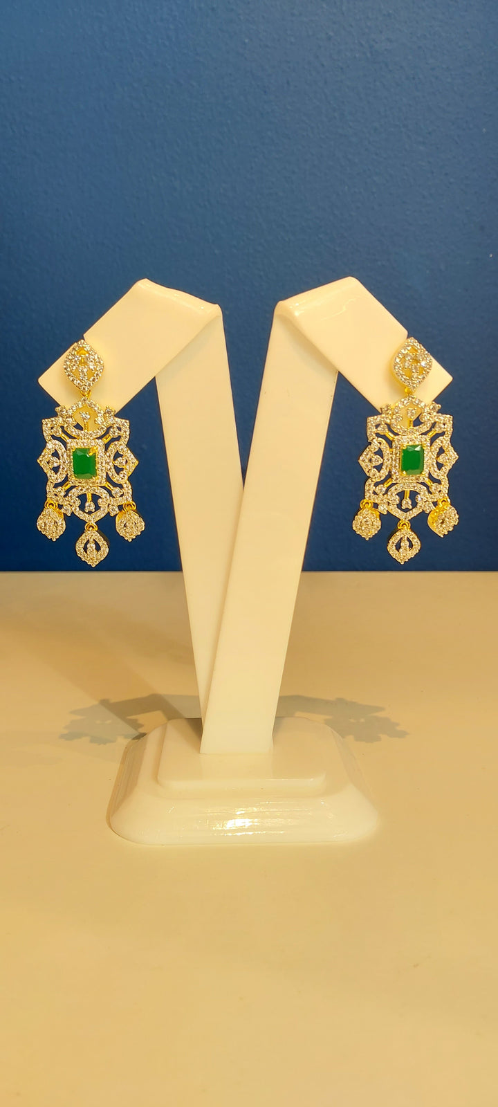 Riddhima Zircon Diamond, Gold and Emerald Destination Necklace and Earrings Set