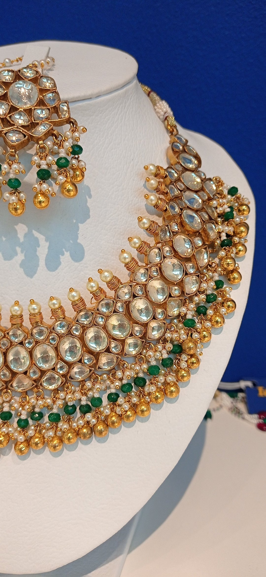 Varania Green Kundan and Imitation Polki Diamonds Necklace, Earrings and Teeka Set