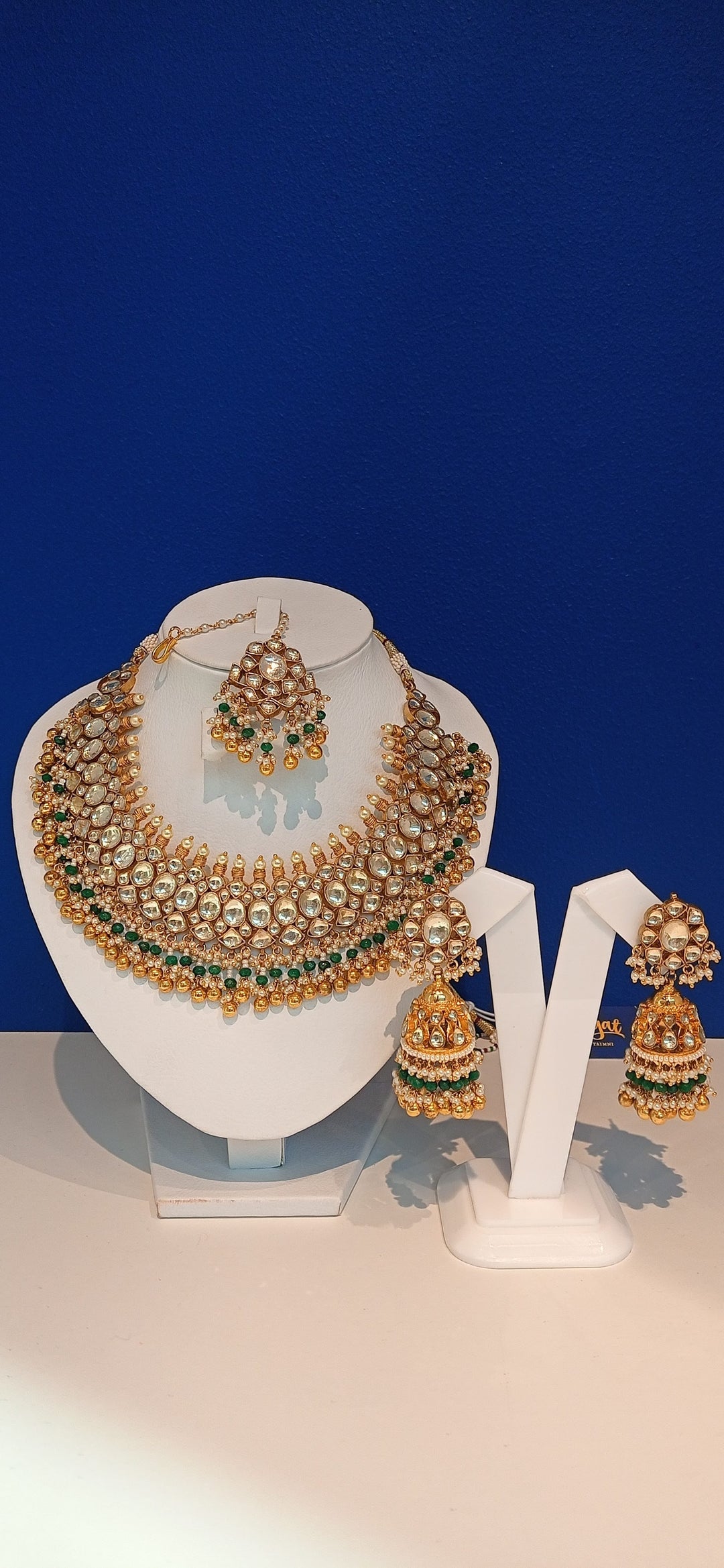 Varania Green Kundan and Imitation Polki Diamonds Necklace, Earrings and Teeka Set