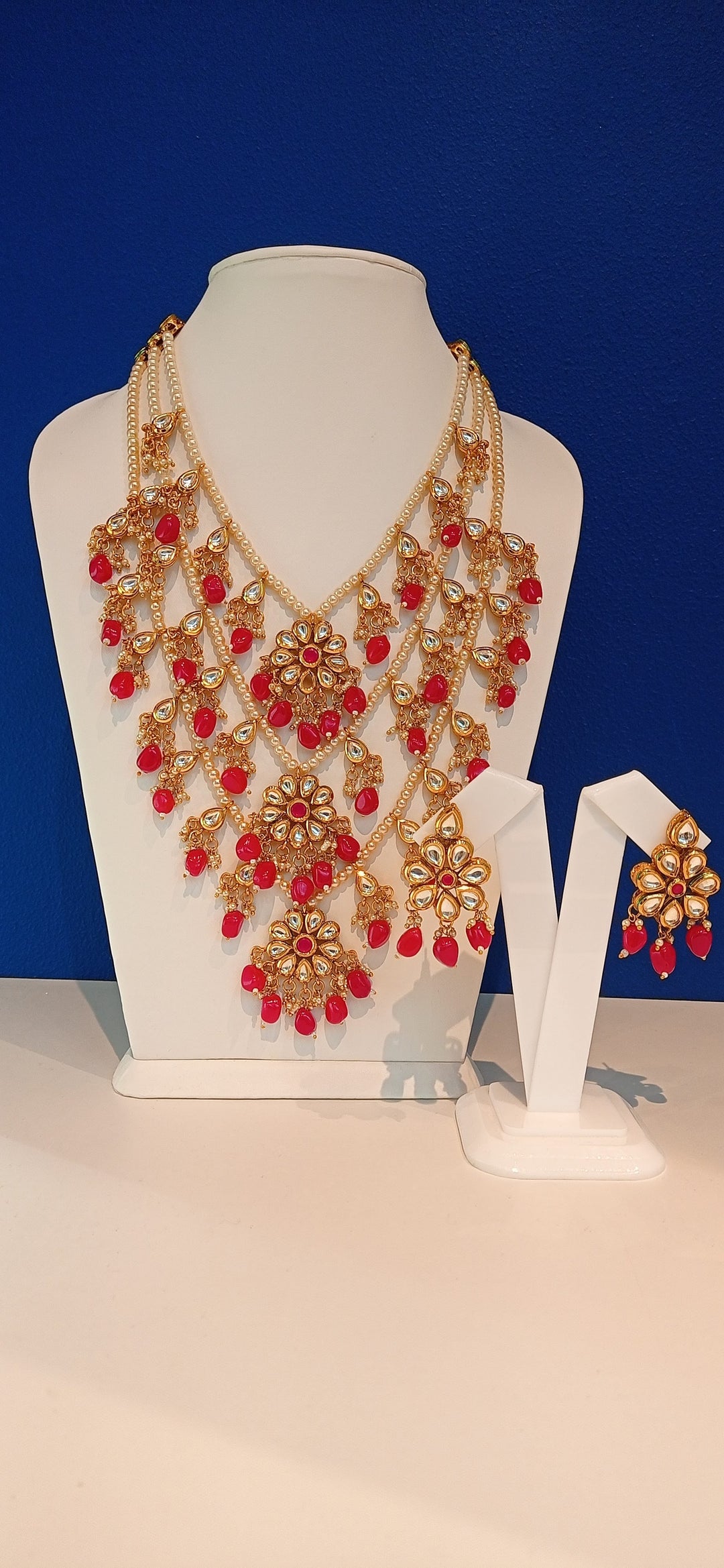 Avantika Floral Multi-Strand Kundan Wedding Necklace and Earring Set with Red Beads